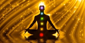 meditator-in-lotus-golden-light-background-chakras1